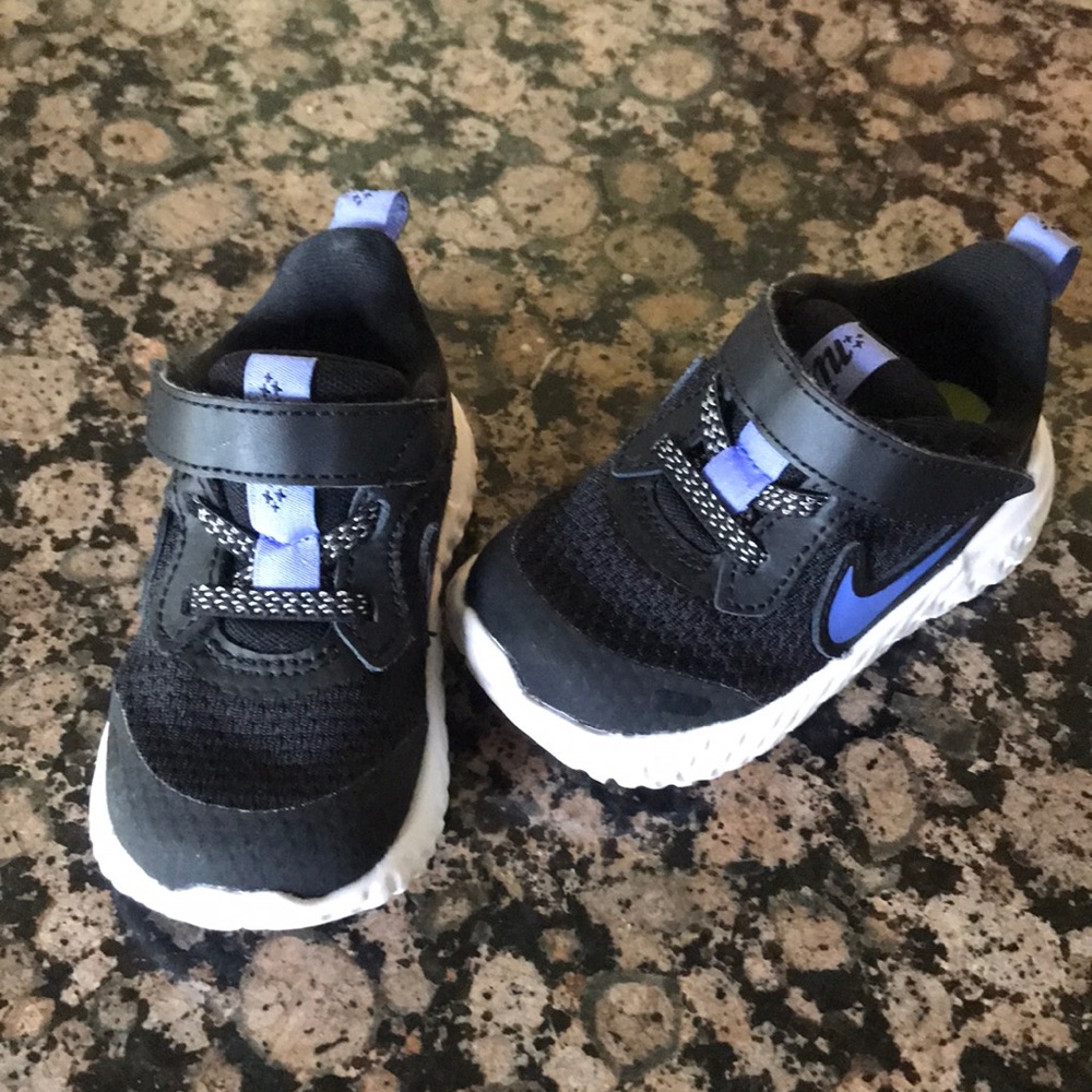 Brand new Nike running baby shoe size 5.